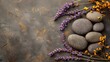 Massage stones with lavender sprigs. Banner with copy space. Concept: skin care, relaxation and therapy. Improvement of the body