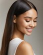 © Marko - Back view of attractive woman, looking down and smiling, skincare concept
