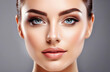© Yekatseryna - Beautiful young woman with clean fresh skin and makeup in studio light. Beauty model, skin care concept
