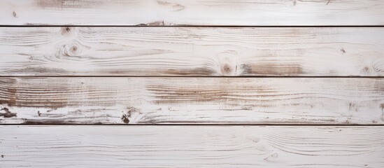 Canvas Print - A closeup of a rectangular brown hardwood table with a wood stain finish. The table is made of plywood planks and sits on a beige flooring, with a blurred background