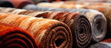 A Pile Of Rolled Carpets Stacked On Top Of Each Other, Like Layers In A Dish. The Diverse Textures And Colors Resemble A Culinary Masterpiece In The World Of Art