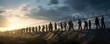 group of refugees behind a barbed wire fence during sunset, signaling the loss of freedom and hope