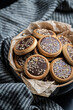 Mini chocolate tart decorated with walnuts. chocolate tart cookie with walnuts.