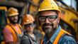 group portrait of construction workers with background of excavation machinery