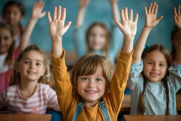 Wall Mural - A group of children are in a classroom and one of them is raising their hand