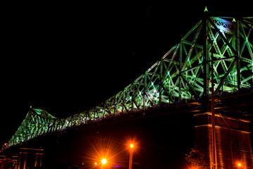 Montreal, Canada - October 4 2018: Jacques Cartier Bridge night Picture taken from southern side of Saint Lawrence River