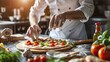 © Ilmi - Make a pizza. male chef preparing pizza in professional modern kitchen background, close up, local food, traditional Italian pizza, handmade whole foods. Banner pizza