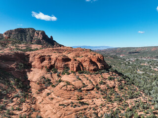 Wall Mural - Sedona, Arizona Area Landscape on a Partly Cloudy day with parts of the Red Rock Park and a Blue Sky