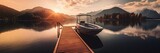 Fototapeta  - Small boat docked at wooden pier at a lake