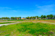 Large vacant land ready for development, under the clear blue sky.