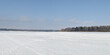 Winter fishing on the lake, beautiful panorama.
