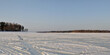 Winter fishing on the lake, beautiful panorama.