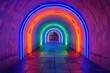 A tunnel illuminated by neon rainbow light arches presents a mesmerizing walkway
