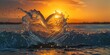 Heart shape formed by a splash of clear sea waves in the rays of the sun