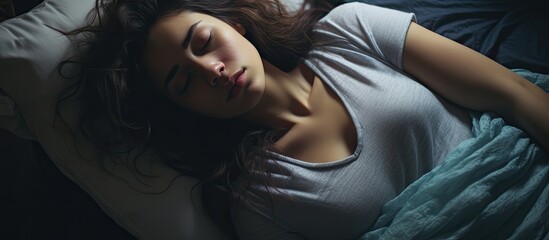 Wall Mural - Contemplative Woman Relaxing in Bed Surrounded by Cozy Pillows and Soft Blankets