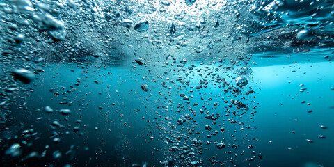 Wall Mural - close up air bubbles in  water ocean, underwater photography water in natural light, blue and teal enderwater 