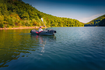 Sticker - Trip on the river by canoe. Picturesque summer view of Dnister river, Ukraine, Europe. Amazing morning scene of green foliage forest on the mountain canyon. Traveling concept background.