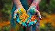 Closeup of hands holding colorful powder. Happy holi concept