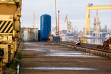 Fototapeta Miasto - the quay of the ship repair yard including cranes