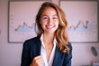 © Aris - Caucasian business woman smile facing a graph with trend, stock sales market