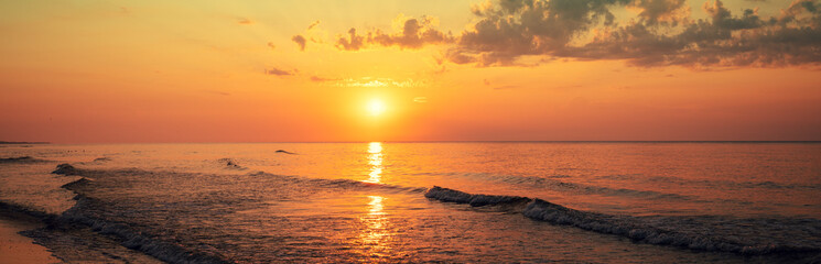 Wall Mural - seascape in the early morning. sunrise over the sea. nature landscape. horizontal banner
