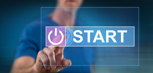Wall Mural - Man touching a start concept