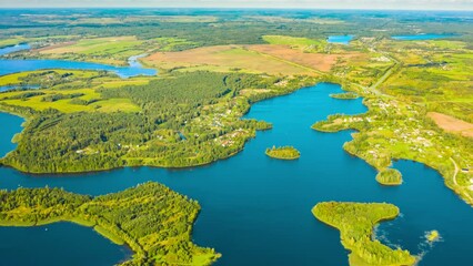 Poster - Hyperlapse Timelapse Dronelapse Aerial View Of Villages Houses On Rivers Lakes Islands Summer Day. Top View Of Lake Nature From Attitude. Scenery Scenic Calm Landscape.