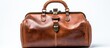 © 2rogan - A rectangular brown leather doctors bag, a fashion accessory, sits on a white surface made of composite material, metal hardware details on shoulder straps, perfect for an event