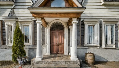 Wall Mural - entrance to the church of st john the baptist, Main entrance door in house. Wooden front door with gabled porch and landing. Exterior of georgian style home cottage with columns