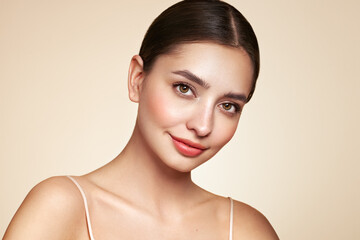 Wall Mural - portrait beautiful young woman with clean fresh skin. model with healthy skin, close up portrait. co