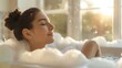 A woman is seen lying down in a bathtub filled with bubbles, surrounded by a serene ambiance. She appears relaxed and indulging in self-care, creating a tranquil atmosphere.