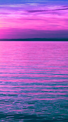 Wall Mural - seascape in the evening. sunset over the sea. dramatic sky. natural landscape. vertical banner