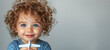 Cute, little boy holding toy airplane. Banner with copyspace. Shallow depth of field.