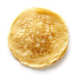 A top view of a golden, fluffy pancake with crispy edges on a white background