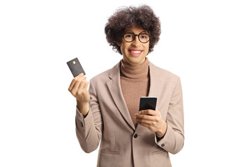 Sticker - Happy young man holding a credit card and a smartphone