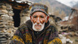 Portrait of an old man, an indigenous resident of a mountain village in the Caucasus in national clothes, personifying the national image of a mountain man