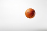 Fototapeta  - A minimalistic depiction of a basketball mid-air, aiming for the hoop, in a serene, uncluttered setting.
