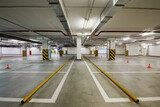 Fototapeta  - Parking places at underground parking.