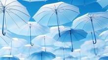 Sleek Geometric Umbrellas In Various Shades Of Blue Open Against A Clear Blue Sky Aerial View High Resolution