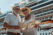 Smiling elderly couple look at map in front of a large cruise ship at sunny morning. Generative AI