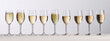 6 champagne glasses with different levels of champagne in them on a beige background.