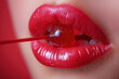 female red sexy lips sucking lollipop close-up