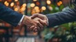 © Katsiaryna - Handshake of business people. Businessmen shaking hands with each other. Business concept.