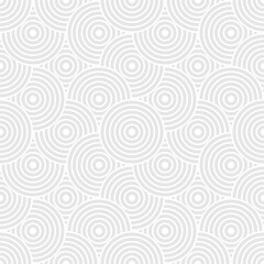 Wall Mural - Seamless trendy pattern of circles and arcs, geometric white shapes for textiles and wallpaper. Festive Christmas pattern on a gray background.