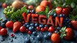 The word VEGAN amidst a vibrant fresh berries and vegetables