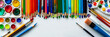 © VicenSanh - A variety of colorful art supplies neatly arranged on a white table, ready for a creative project