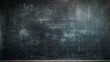 A close-up of an empty blackboard, the traces of yesterday's lessons faintly visible, telling a story of learning and erasure, School