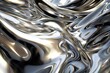 Abstract silver liquid metal texture with reflections and wavy patterns.