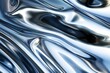 Abstract fluid silver waves with a metallic sheen and reflections.