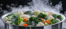 The Versatility Of The Vegetable Steamer Cooks A Mixture Of Different Vegetables At The Same Time, Including Broccoli, Carrots And Cauliflower.
